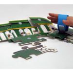 Velcro bracelet helps pick up puzzle pieces