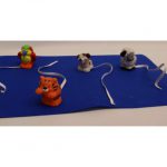 Play mat with toys attached