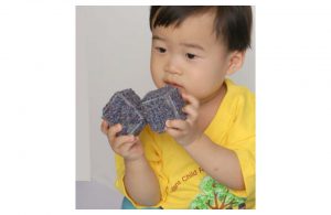 Example of child playing with textured blocks